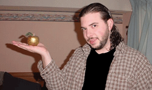 Professor Mu-Chao holding the Golden Apple of Eris, i.e. a Pineapple
